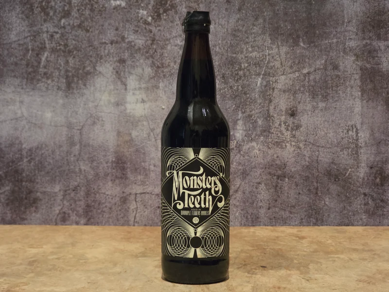 Modern Times - Monster's Teeth aged in Quadruple Flowers Barrels